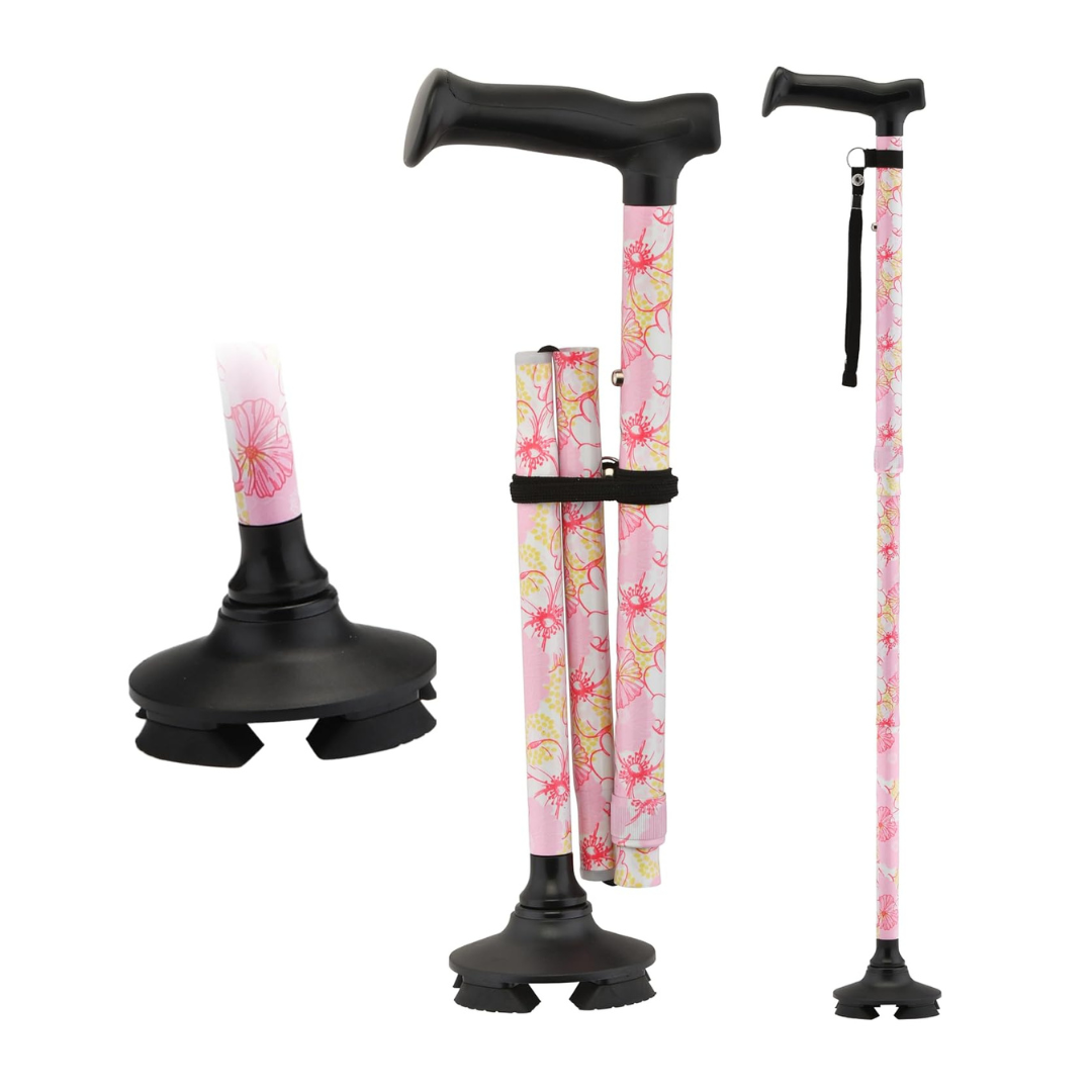 The Nova Medical Folding Cane with Standing Pivot Tip features a pink floral design, black ergonomic handle, adjustable height, and a wide quad base for stability. Shown fully extended, folded, and with a close-up of the pivot tip.